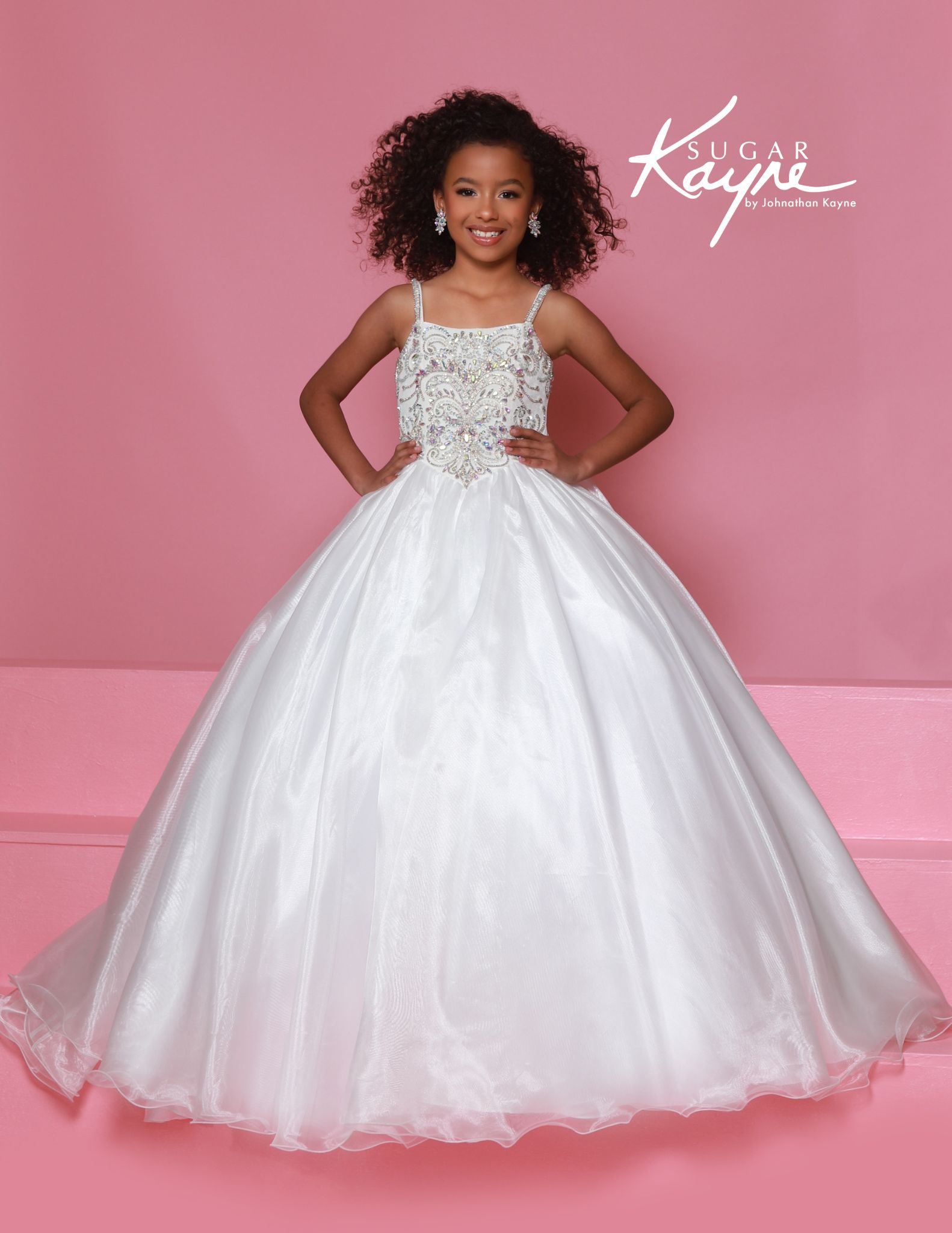 White kids off-the-shoulder pageant ball gown with intricate beading.
